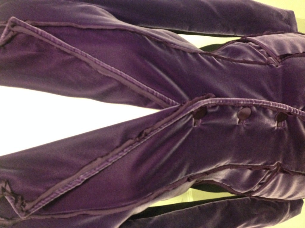 Prince isn't the only one who can look fabulous in purple velvet!

Vibrant purple velvet is trimmed with purple silk for a sophisticated, deconstructed look.  Black panels in the arms and side give you contrast and are sure to flatter any figure. 