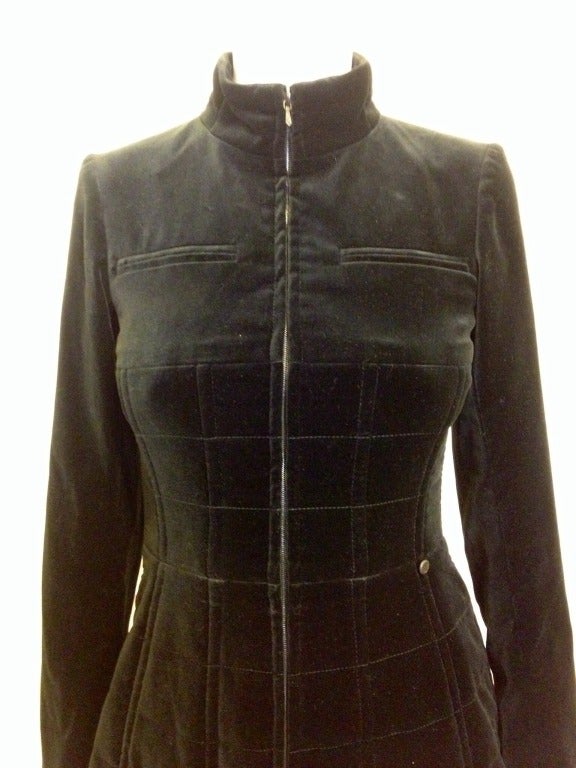 With gorgeous, super-soft black velvet and precise grid quilting, this Chanel jacket is beautiful! Flared hips and a structured waist create a feminine yet clean silhouette, making this an extremely versatile piece that you will be sure to wear time