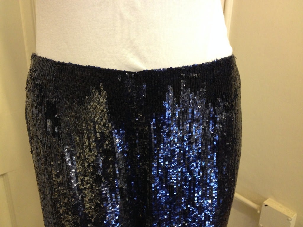 Fit for a disco queen! With all-over sparkle and a deep, saturated color, these pants are perfect when you want to make a statement. The leg is cut wide, which both allows the fabric to move beautifully and adds a level of subtlety to an otherwise