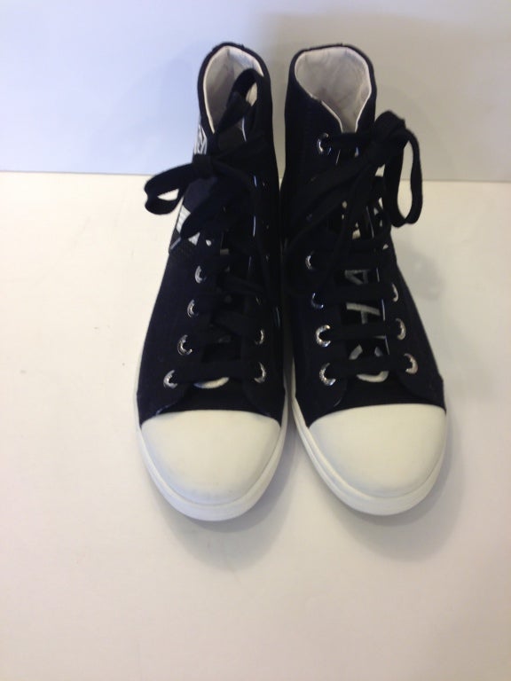 Women's Chanel Black And White Sneakers