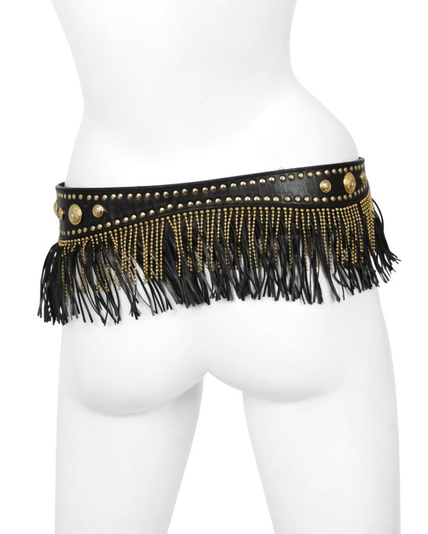 Black leather belt with Medusa studs and gold bead & leather fringe wrapping around back.