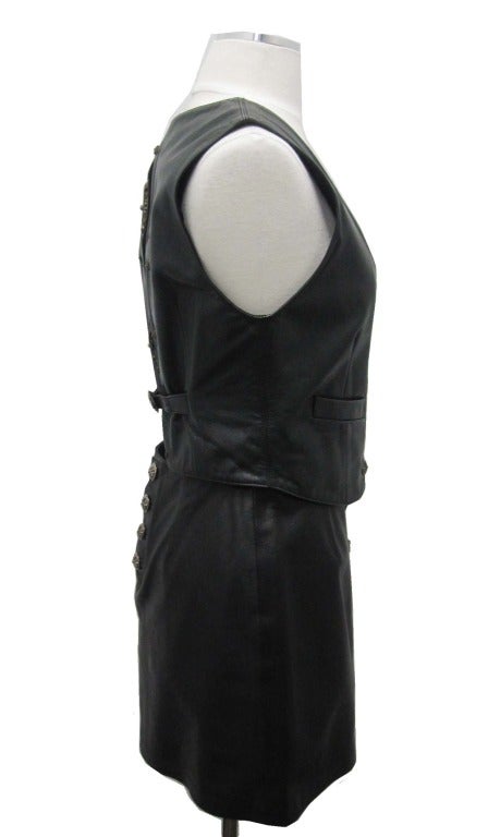 Chrome Hearts 2 pc / Vest & Mini Skirt.  Fluer-de-lis on back.

Vest Measurements
- Bust 34