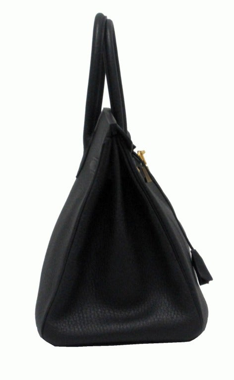 Classic! Perfect bag in black and gold! 

- 2008
- Clemence leather 
- Gold hardware
- 4 gold feet on bottom
- Blind stamp 
