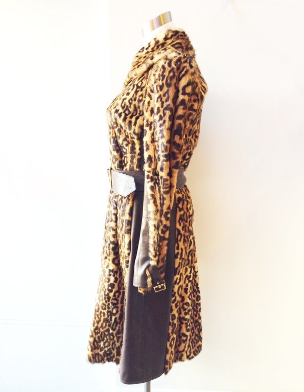 Custom made couture coat! Gorgeous leather and dyed mink.

-Size 40
-Retail $27k
-Only one ever made!