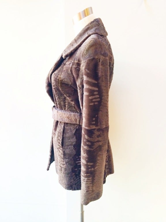 Soft and luxurious Persian lamb coat with optional belt.  Italian size 38.