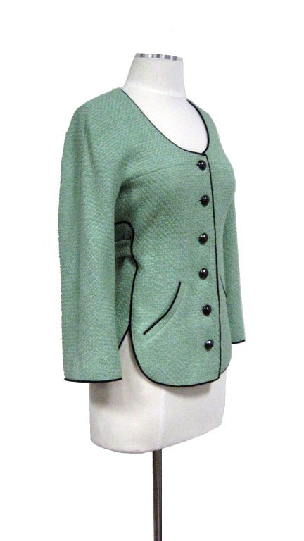 How cute is this?! Great color contrast & detail!

- Mint color cotton boucle body
- Black piping trim
- Tie in back
- Round buttons with 