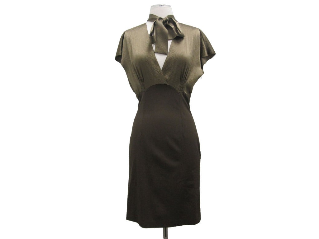 Stunning dark olive Dior.  Ties around neck with high waisted skirt.

- Bust 16 1/2