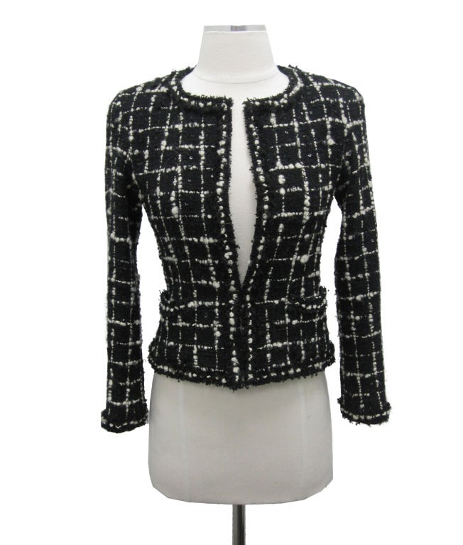 Black and white tweed jacket 03c Chanel.

- Bust 16.5