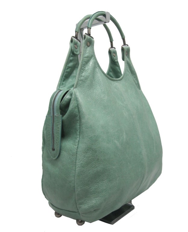 Balenciaga handbag in Sea foam green.

- Width 14