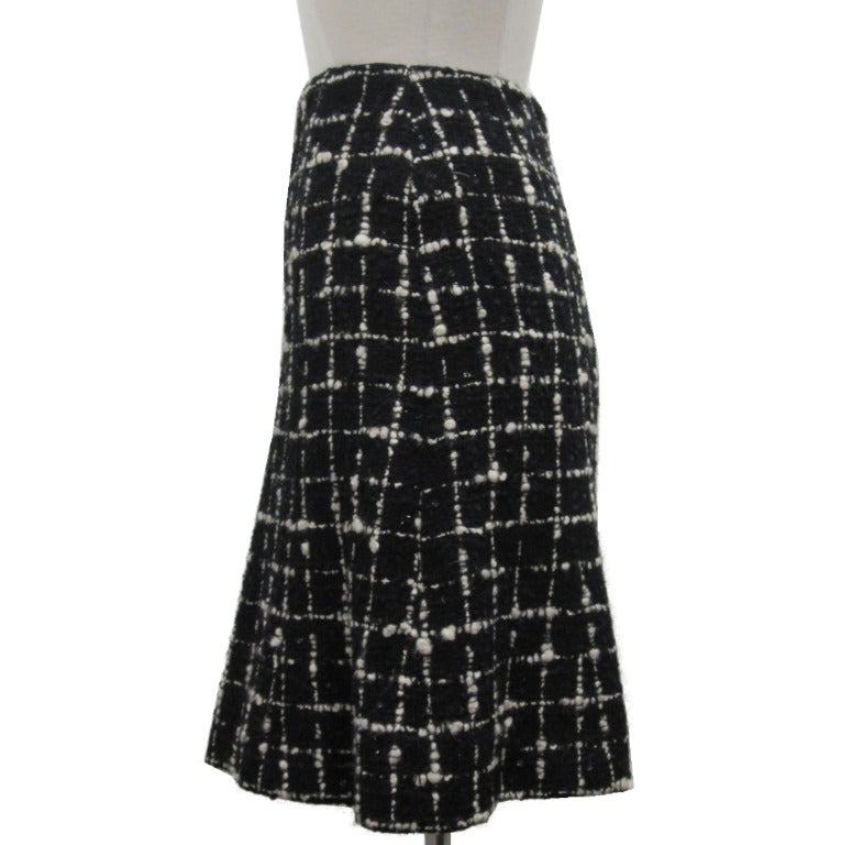 Chanel  Boucle with Sequins A-line Skirt.

- Waist 12