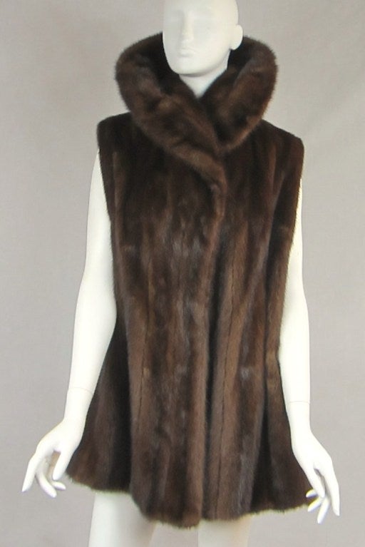 Versatile and stunning! look at the collar on this one! Love vintage furs and when they are updated for today's fashion, all the better
O/S with a fabulous swing to it. Wear it with a belt or not. 

A great piece to wear with your LBD or a pair