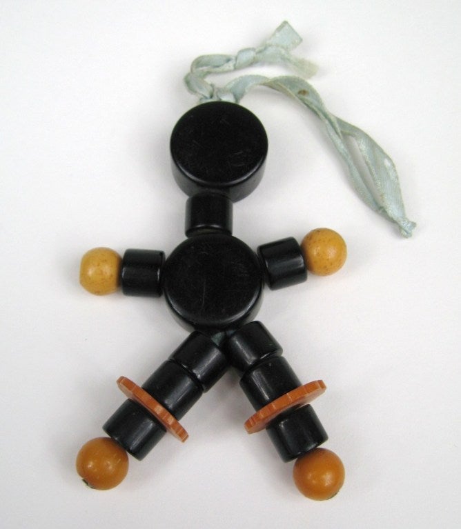 1930's Black  Butterscotch Bakelite Catalin Pendant Crib Toy In Excellent Condition For Sale In Wallkill, NY