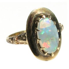 Claw set Opal Gold Ring