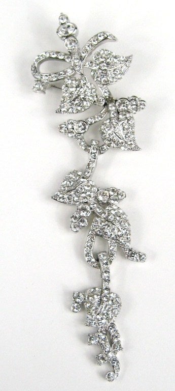 Stunning on this Nolan Miller Cascading Brooch

Add a little sparkle to your attire. 

Measuring 4-7/8