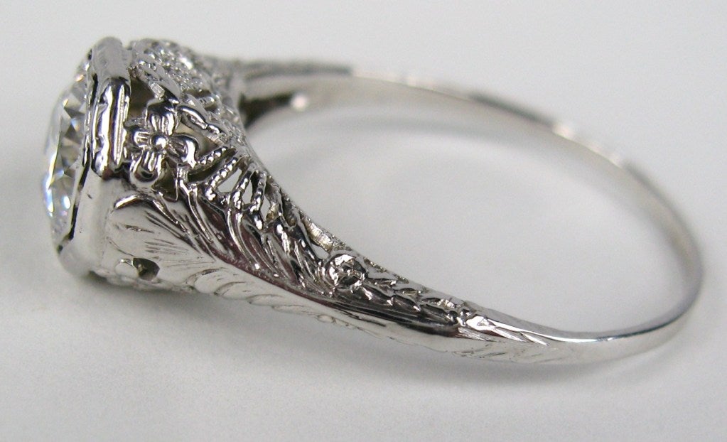 Lovely Filigree work on this 14K White Gold Art Deco Ring with center White Sapphire
Ring is a size 10