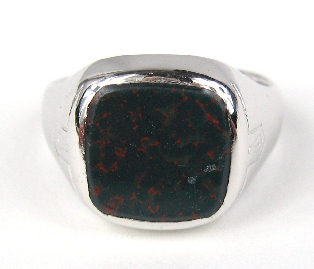 Stunning Unisex mid century Ring.
Center is bloodstone approx 56" x .56" 
Ring is a size 10 and can be sized by us or your jeweler
Any questions please call, email or hit contact 