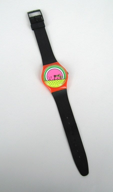 This is a 1985 Keith Haring Swatch Watch called Break Dance
Limited to 9,999 Pieces, Sold in the USA Only.
Inspired by the Keith Haring Breakdance Poster.
It looks like it was worn once or twice.