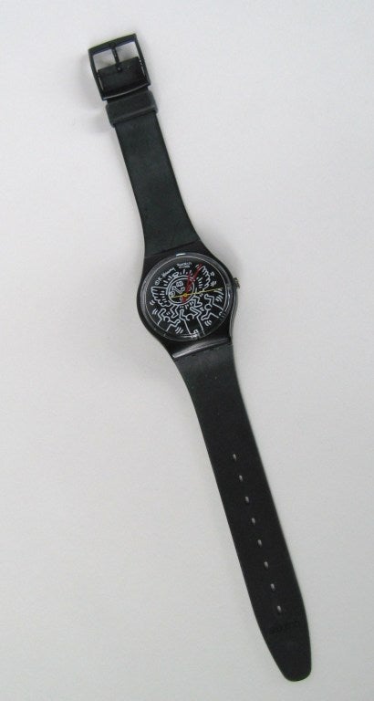 This is a 1985 Keith Haring Swatch Watch Model Blanc sur Noir
Limited to 9,999 Pieces.
Designed by Keith Haring.
It looks like it was worn once or twice.