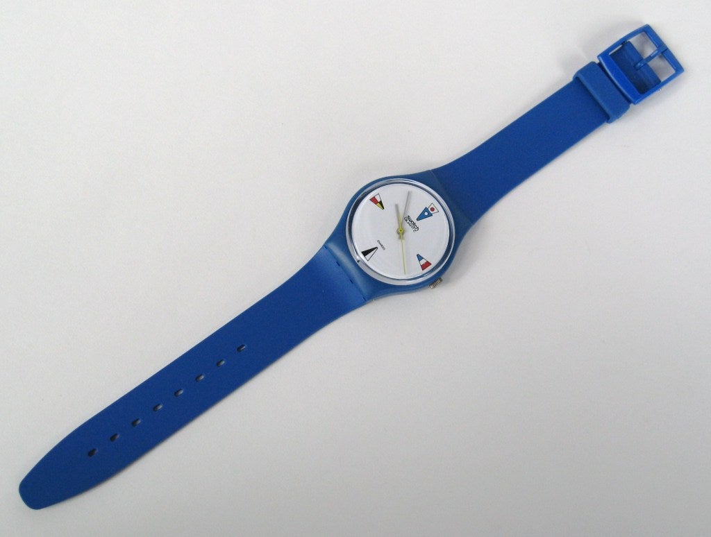 New never worn, 1984 Swatch Watch 4 Flags GS-100
It looks like it was never worn.