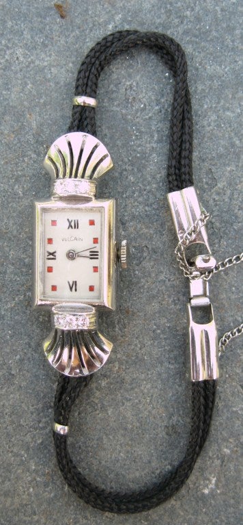 A stunning Vulcain Art Deco platinum and diamond lady's wristwatch.

What a wonderful piece of jewelry! Take a close look a the photo's and you will see how stunning this watch is. Six accent diamonds, three on top, three on the bottom of the