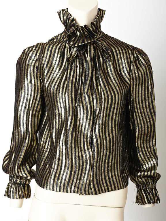 Pauline Trigere gold and black lame stripe blouse with ruffle collar and cuff detail.