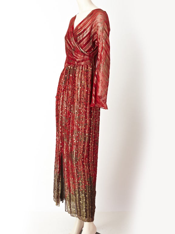 Bill Blass lurex and chiffon red and chocolate brown evening dress with draped bodice. Dress has a subtle print with scattered
copper sequins. Underpinning is chocolate brown chiffon.