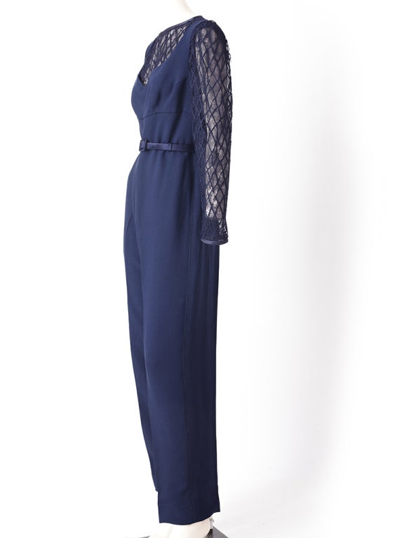 Odicini, couture, navy blue, silk crepe jumpsuit with attached lace, jeweled neck, long sleeve underpinning and satin belt.