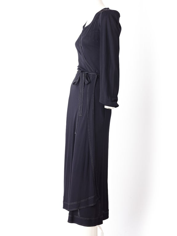 Jean Muir, black, matte jersey wrap dress with bias cut skirt,slightly puffed shoulder and top stitching detail.
