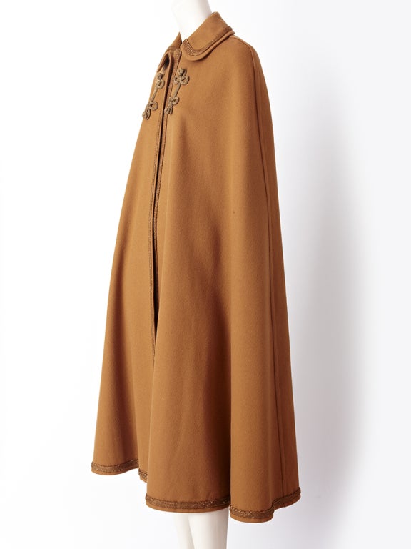 YSL, wool, butterscotch tone cape with collar and braiding  and passementerie detail.