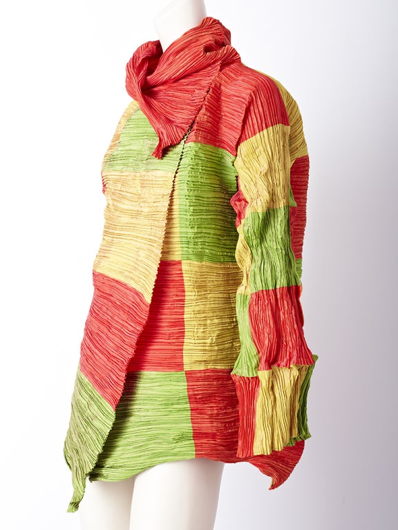 Issey Miyake, patchwork, color block, pleated taffeta jacket, in 
shades of orange, lime green and yellow.