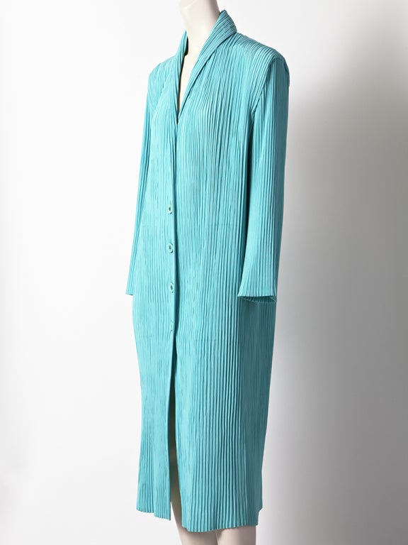 Issey Miyake, robins egg blue pleated coat/dress with shawl collar detail.