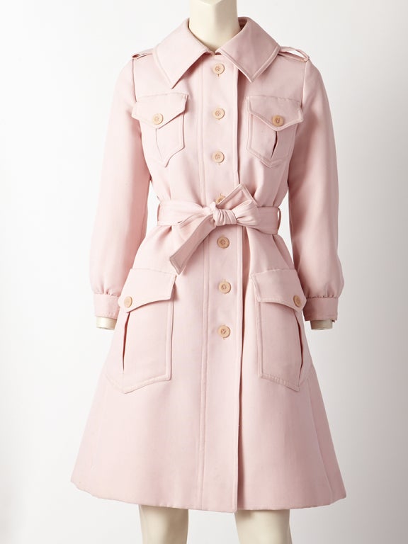 Bill Blass for Bond Street, pink trench with epaulettes, safari style breast and hip pockets an inverted pleat detail at the back.