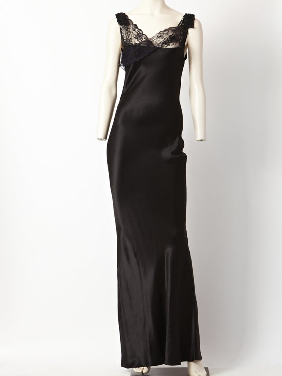 John Galliano, black, satin,  1930's inspired, bias cut, evening gown with fine lace detail at the bust and shoulder.
