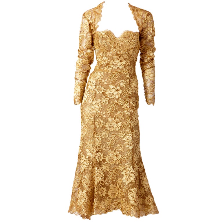 Fernando Sanchez, gold,Guipure lace, strapless, fitted dress with a 