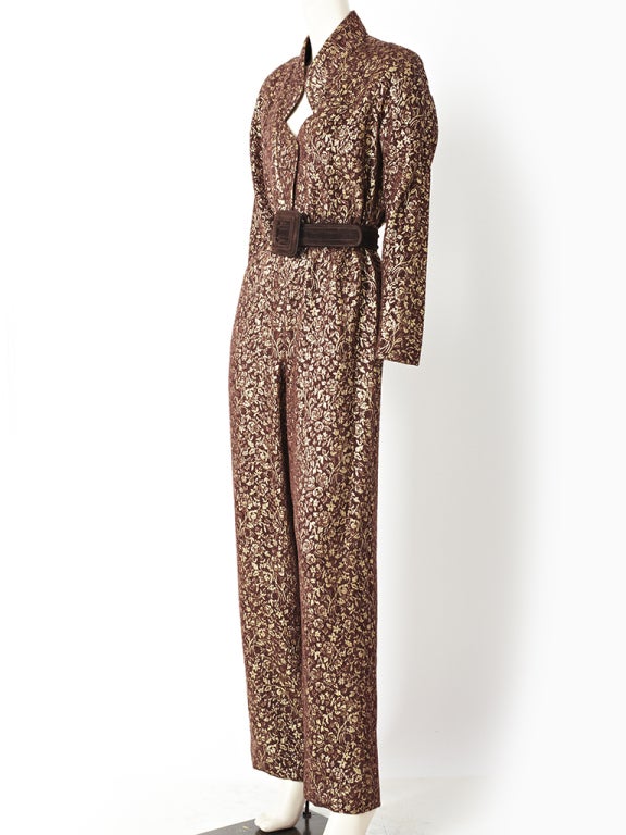 Galanos, lightweight wool, chocolate brown, evening jumpsuit, with a coppery- gold floral motif, woven brocade embellishment. Neckline is 