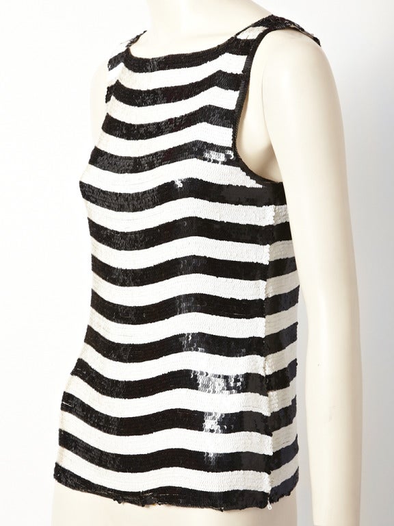 YSL, sequined, black and white stripe , sleeveless top, with bateau neckline and ivory chiffon lining.