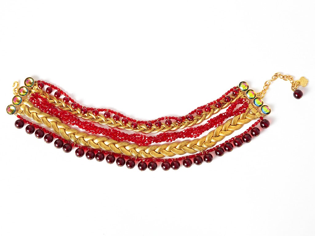 YSL, rive gauche, 5 strand choker with braided gold snake chains, faceted red glass with ruby glass ball drops and twisted faceted red glass chain.