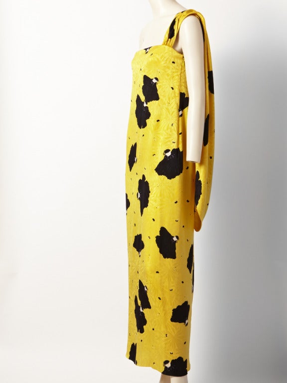 Yellow and black, silk charmeuse, column style one shoulder evening gown attributed to Bill Blass. Gown has a panel
on the left  shoulder that continues and drapes 