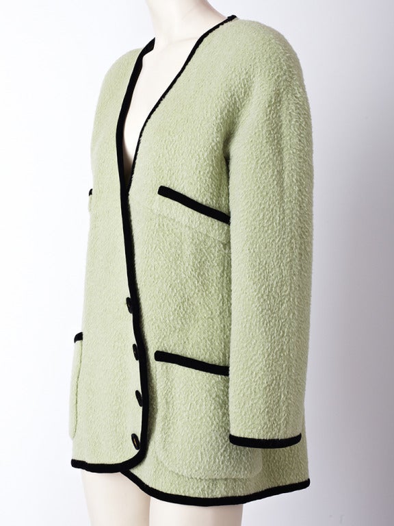 Chanel pale pistachio green, double face wool jacket with velvet trim and asymmetric closure.