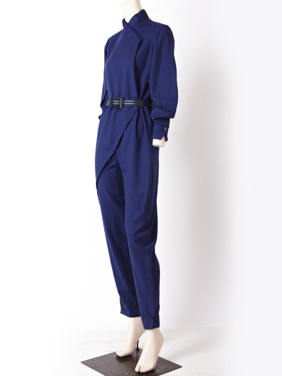 Ronaldus Shamask, navy blue, gaberdine jumpsuit with an Asian inspired silhouette. Mandarin collar with a side closure and a 