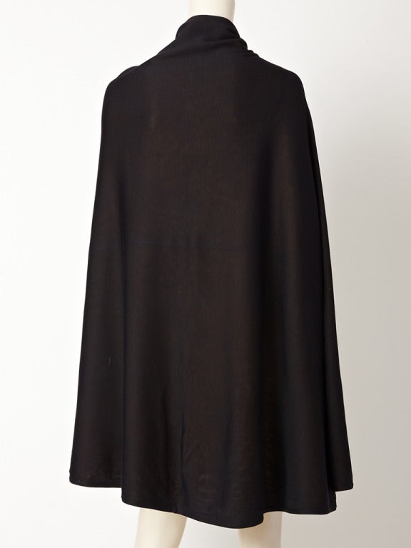 Isabel Canovas, silk knit, chrome yellow and black reversible cape.