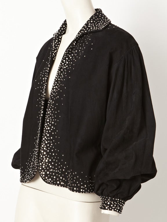 Halston black, suede, jacket with blouson sleeve. Jacket is embellished with silver round head studs.