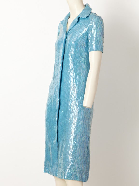 Halston, turquoise, sequined, short sleeve, slightly A line shape shirt dress with narrow lapel collar. C. 1970's.