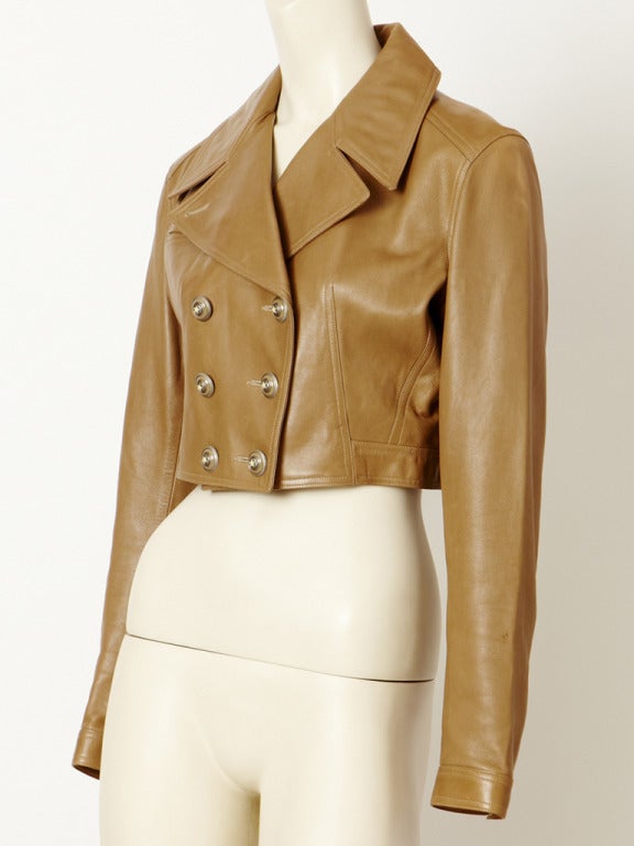 Azzedine Alalia, Tobacco colored supple leather, wide lapels,  double breasted ,fitted, cropped jacket. Zippered pocket detail under the lapel on the right side.