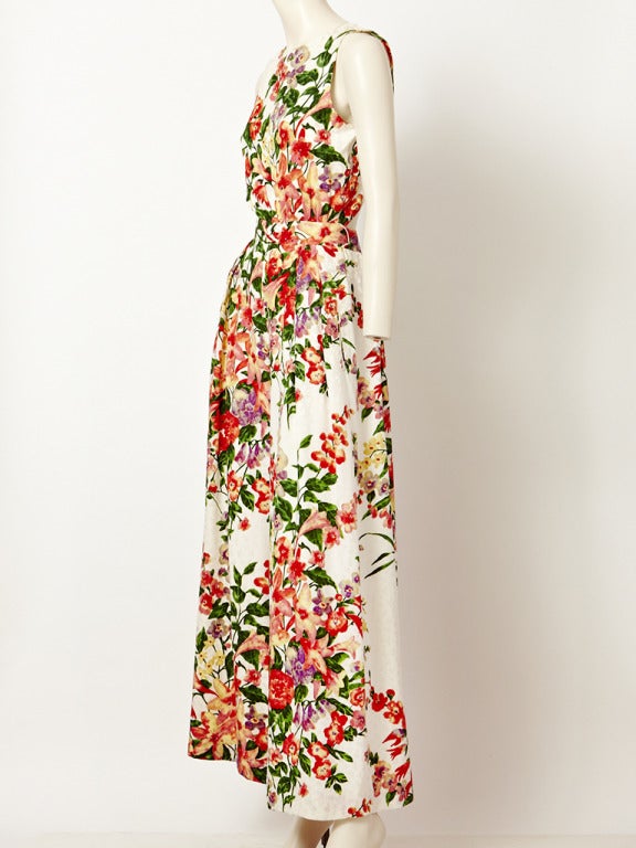 Bill Blass, silk crepe, floral print, sleeveless jumpsuit with wide palazzo trouser.
Back is open.