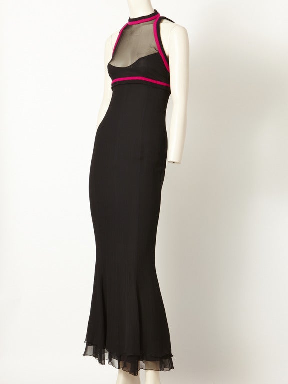 Chanel, black, layered chiffon, bias cut gown with a sleeveless fitted bodice with sheer bustline,  halter cut sleeves and fuschia knit detail edging at armholes, neckline, and under the bust. Back is open.