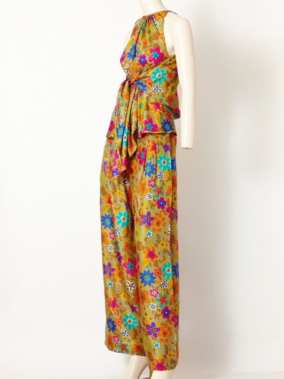 Krizia, multi-toned , floral pattern, silk palazzo, pyjama-like pant ensemble. Wide palazzo, pant with a halter neck, wrap top.