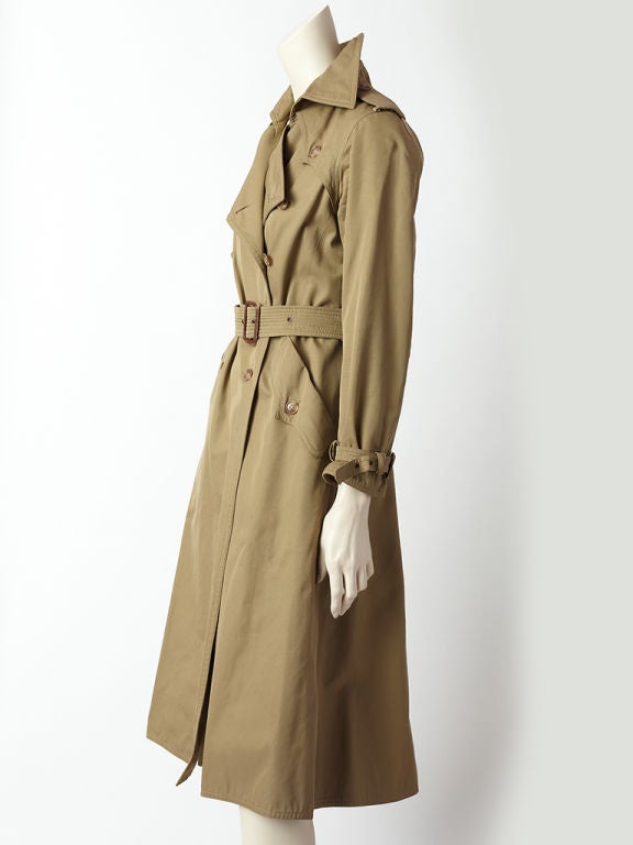 YSl iconic, classic 1970's fitted, khaki trench. Tres Cathrine<br />
Deneuve!