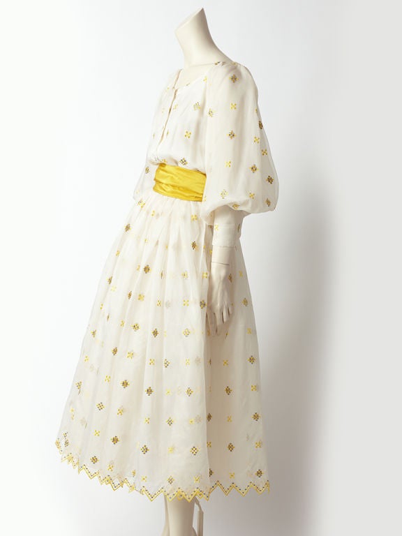 Christian Dior, scoop neck, silk organza dress embellished with golden yellow and gray geometric square shaped motifs. Dress body has full sleeves, a full gathered skirt, finished with a golden yellow taffeta cummerbund at the waist. Perfect dress