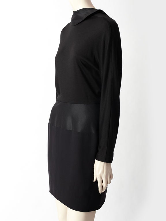 Geoffrey Beene, wool jersey, long sleeve dress with taffeta faille<br />
collar and faille band detail at the hip.